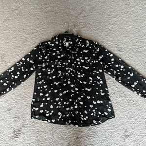 Black sheer blouse with white hearts
